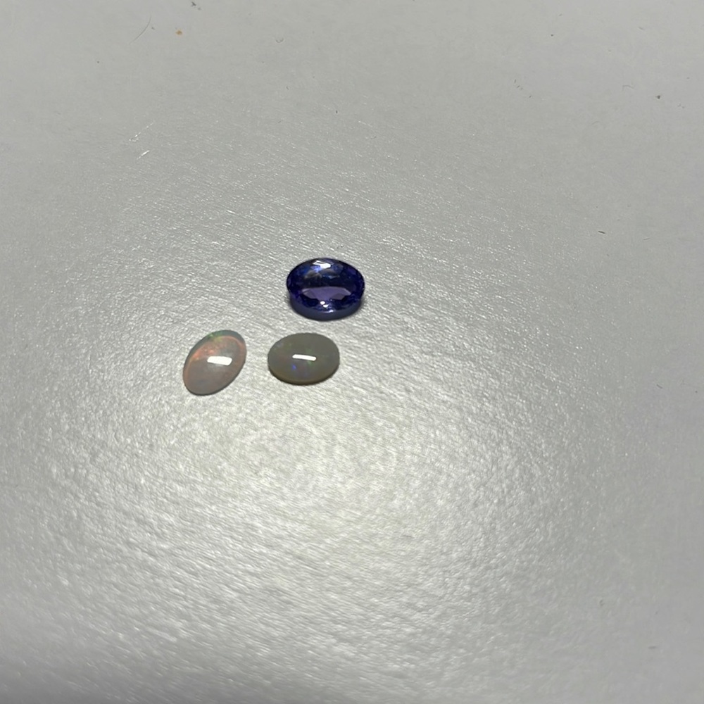 3 Opals And One Tanzanite Oval Gems